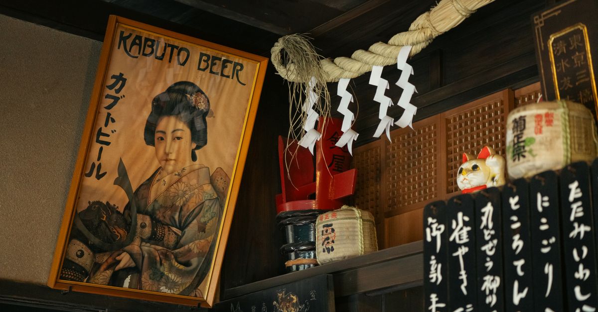Authentic Japanese interior decor featuring a Kabuto Beer poster and traditional elements.